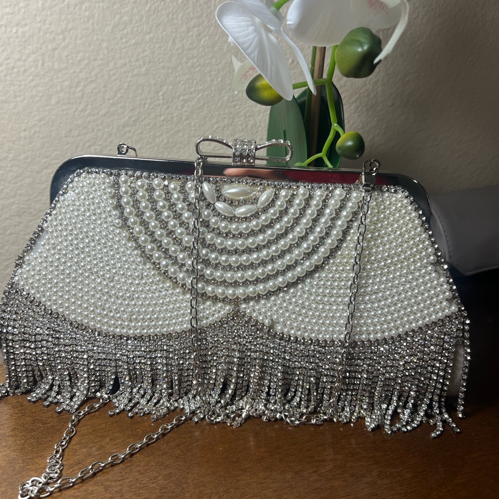 Glamorous Silver Clutch with Beaded Design and Fringe